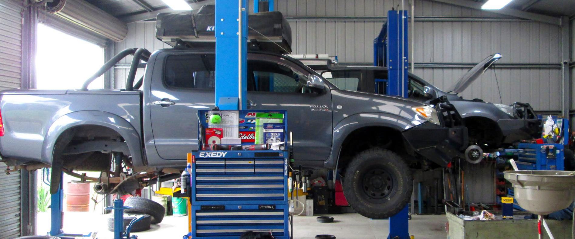 ute on hoist at JMAC Mechanical